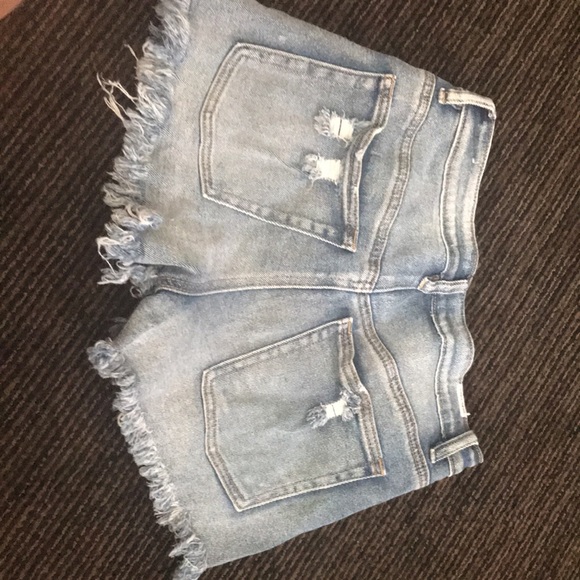 high waisted, distressed jean shorts. - Picture 2 of 3